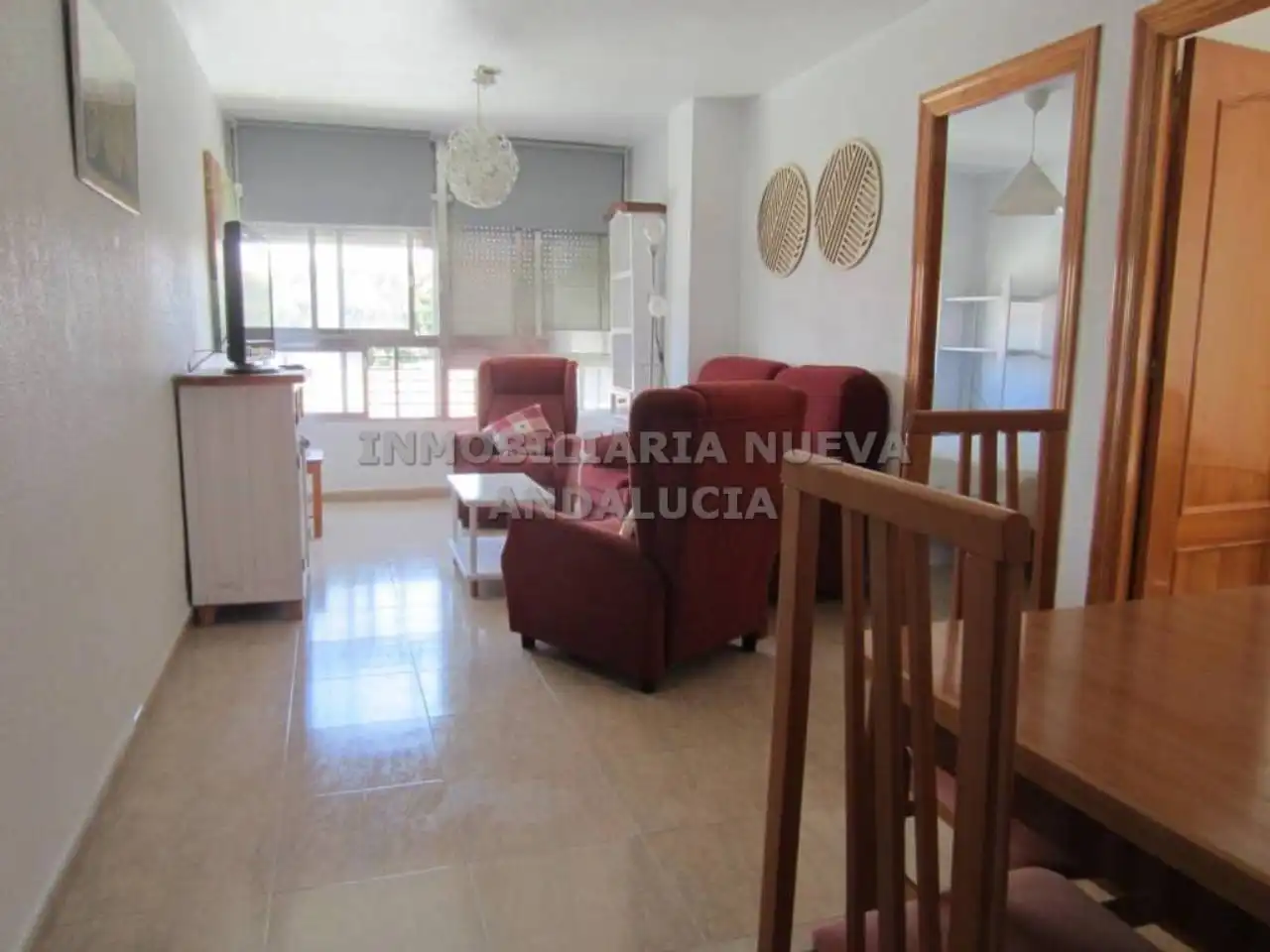 Sala d'estar de Pis de lloguer en Almería amb Aire condicionat i Moblat