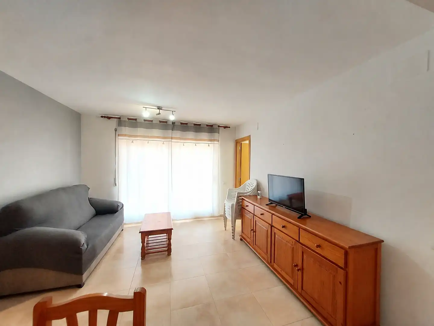Sala d'estar de Planta baixa de lloguer en El Vendrell amb Aire condicionat, Calefacció i Jardí privat