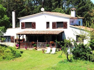 Casa rústica amb jardí en venda a Montbarbat