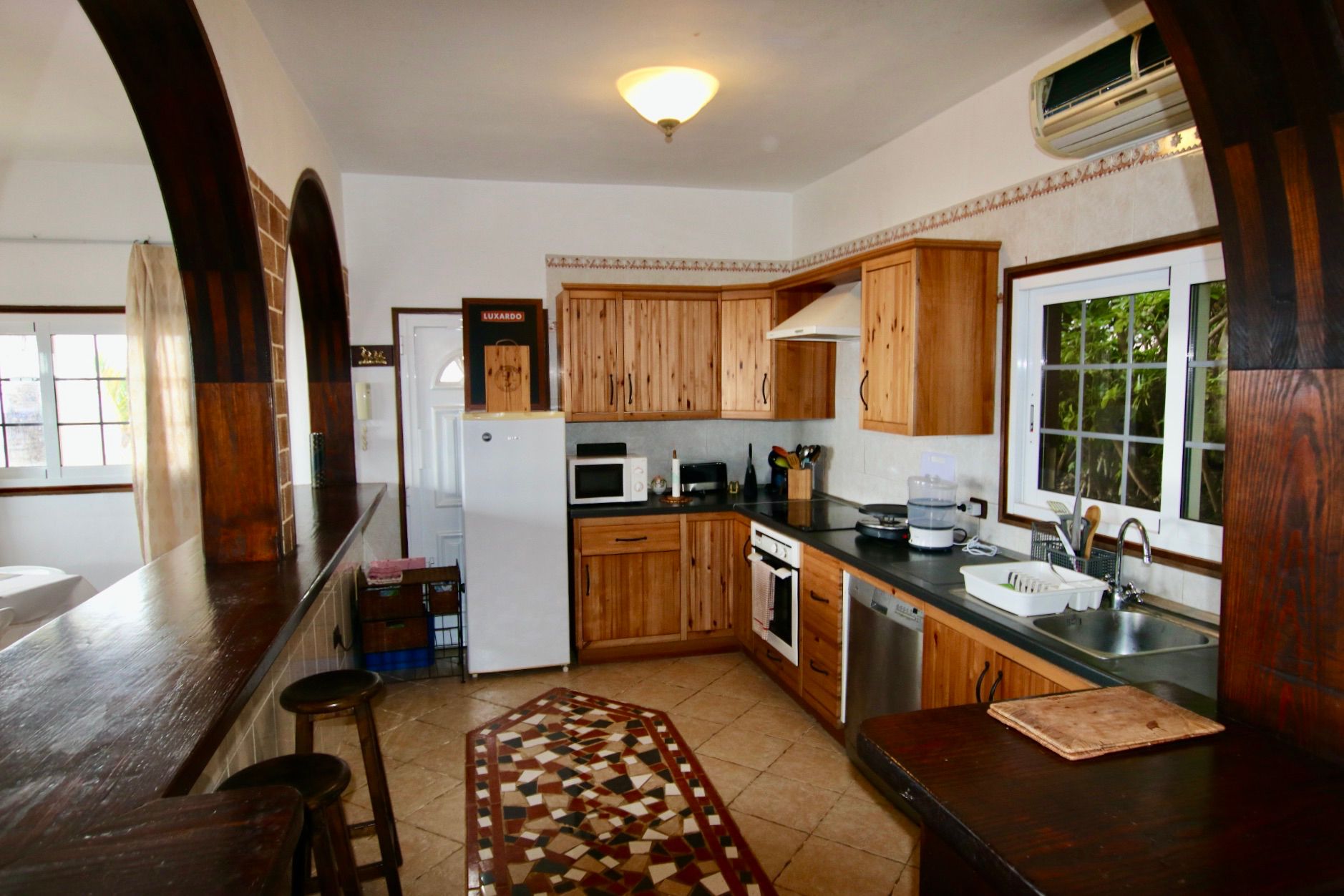 Cuina de Casa o xalet en venda en Guía de Isora amb Calefacció, Jardí privat i Terrassa