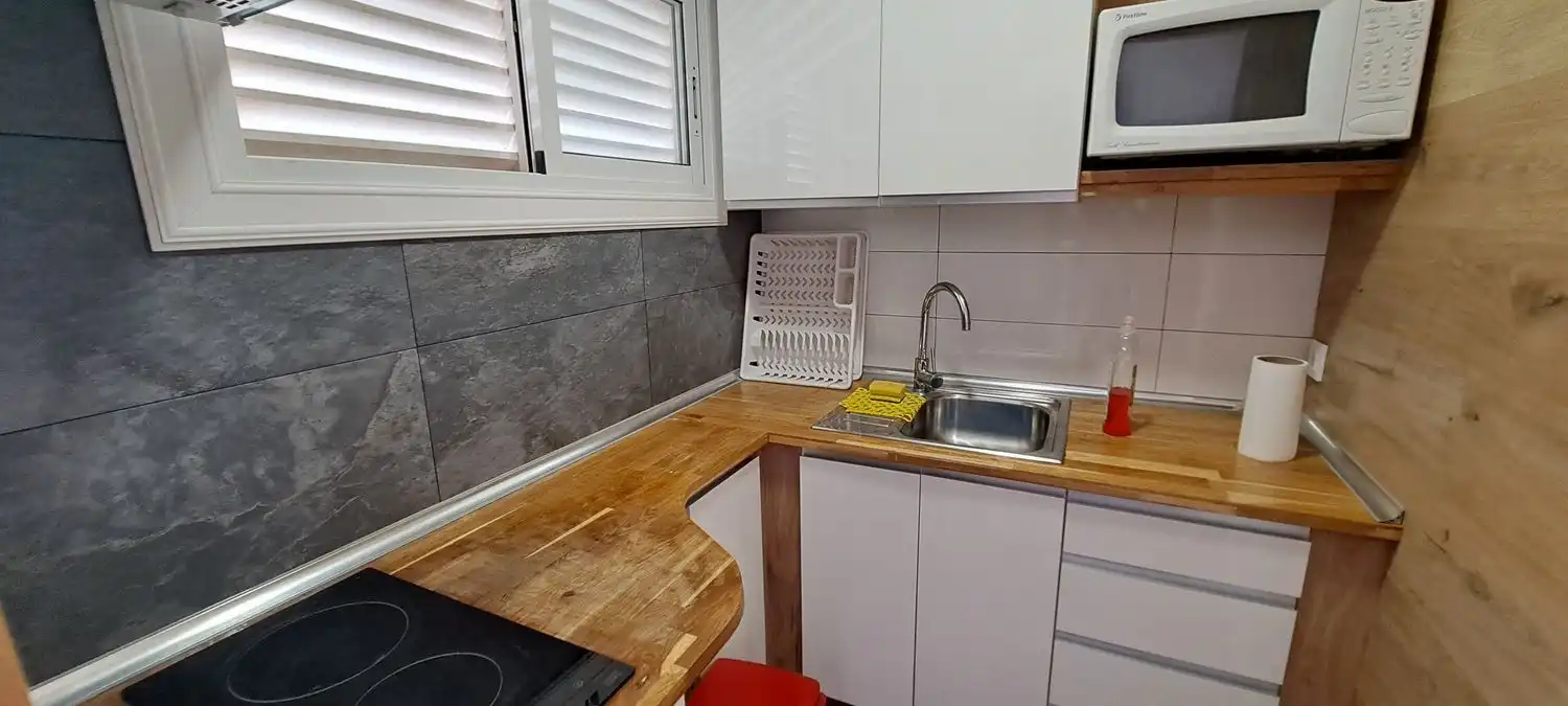Küche von Wohnung zum Verkauf in Salou mit Klimaanlage und Terrasse