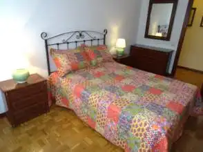Schlafzimmer von Wohnung zur Miete in Gijón  mit Heizung, Parkett und Möbliert