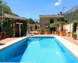 Exterior view of House or chalet for sale in El Castell de Guadalest  with Swimming Pool