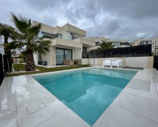 Swimming pool of Single-family semi-detached to rent in Finestrat  with Air Conditioner, Private garden and Terrace