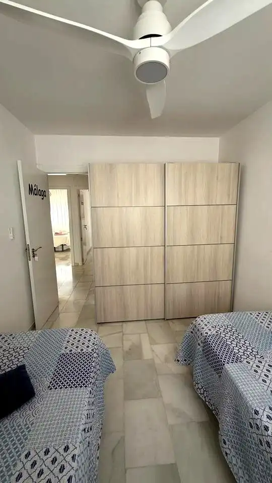 Habitación de Casa adosada en venta en Málaga con Aire acondicionado y Piscina comunitaria
