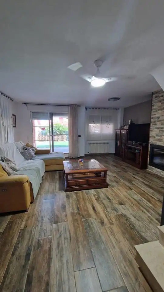 Sala d'estar de Casa o xalet en venda en Moncada amb Jardí privat i Terrassa