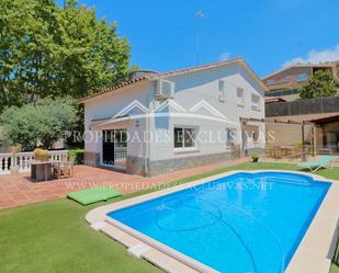 Exterior view of House or chalet for sale in Vilassar de Dalt  with Air Conditioner, Terrace and Swimming Pool