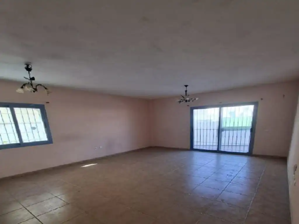 Sala de estar de Casa adosada en venta en Alhaurín de la Torre con Alarma y Piscina comunitaria