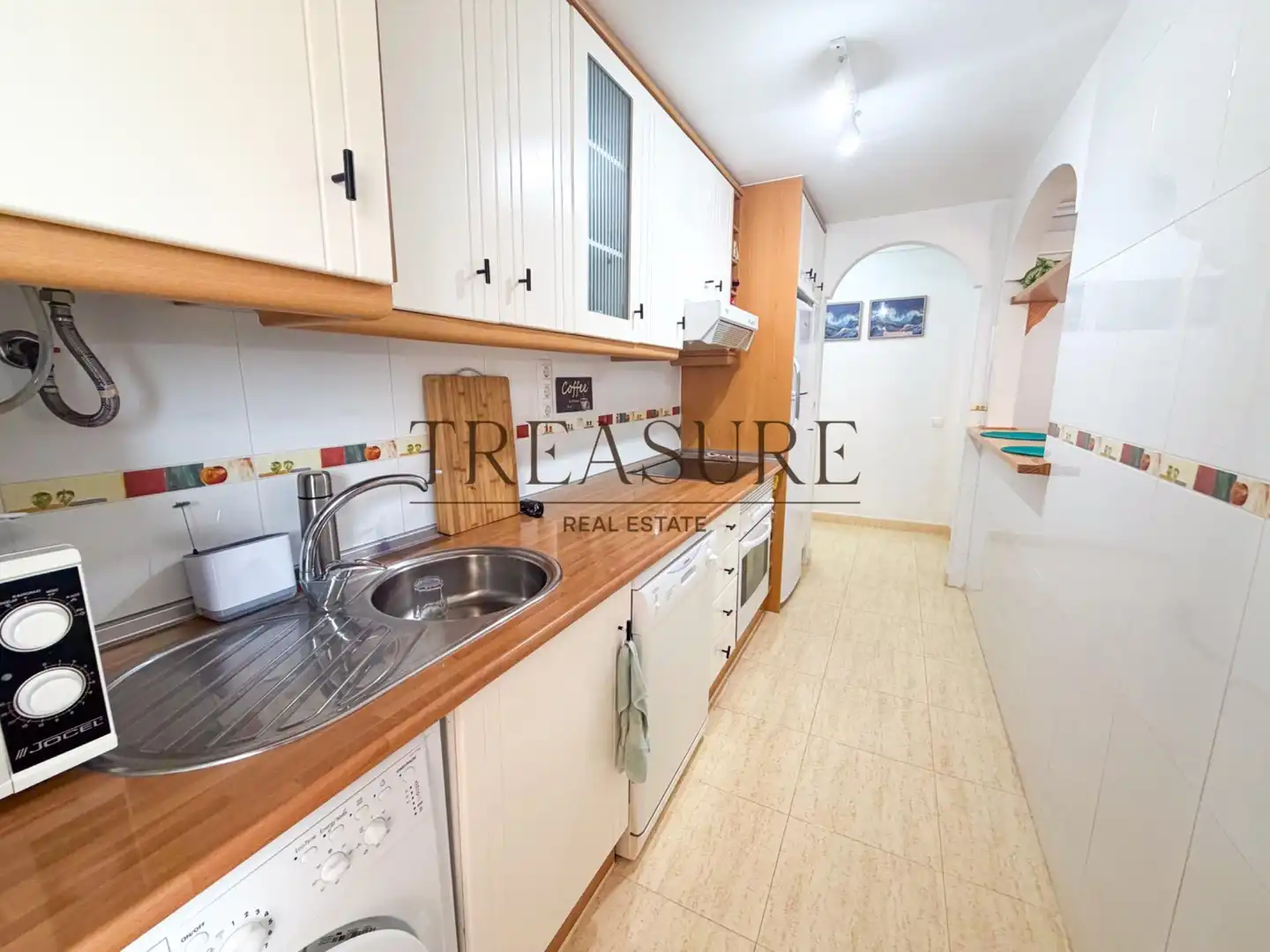Cuina de Apartament en venda en La Manga del Mar Menor amb Aire condicionat, Terrassa i Moblat
