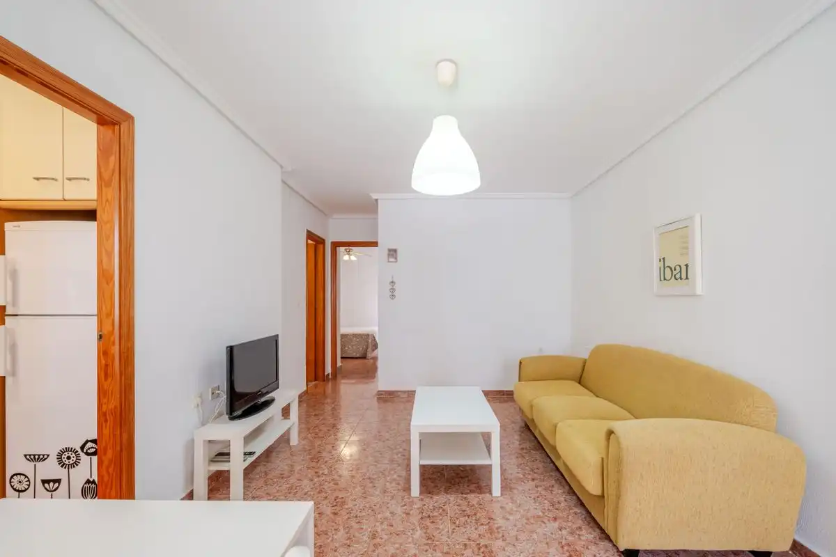 Wohnzimmer von Erdgeschoss zum Verkauf in Santa Pola mit Heizung, Privatgarten und Terrasse