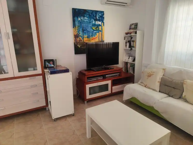 Sala de estar de Casa adosada en venta en Cullera con Aire acondicionado, Calefacción y Terraza