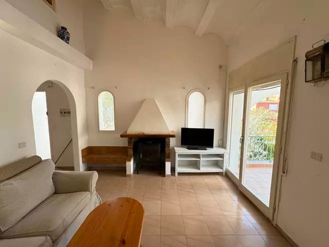 Sala d'estar de Casa o xalet en venda en Colera amb Jardí privat, Terrassa i Moblat