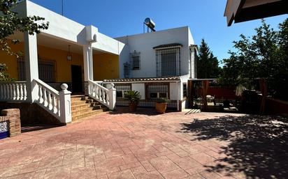 Exterior view of House or chalet for sale in Mairena del Alcor  with Air Conditioner