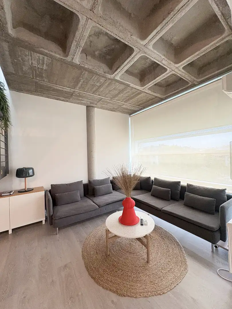 Sala d'estar de Oficina de lloguer en Europolis