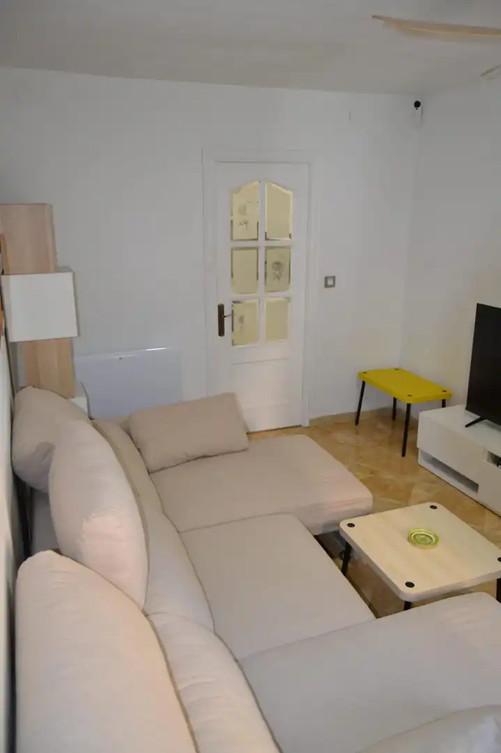 Sala d'estar de Casa o xalet en venda en Málaga amb Calefacció, Terrassa i Moblat