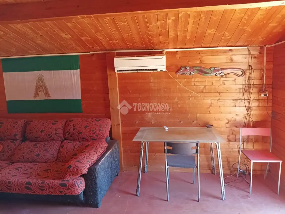 Sala de estar de Finca rústica en venta en Arahal con Aire acondicionado, Parquet y Piscina