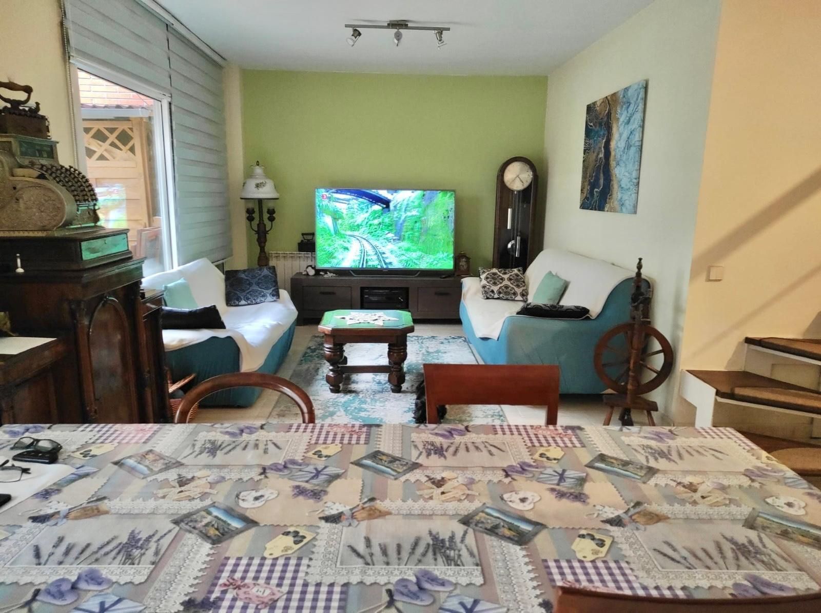 Living room of Single-family semi-detached for sale in Sant Celoni  with Air Conditioner, Heating and Terrace