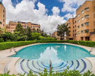 Swimming pool of Flat for sale in  Madrid Capital  with Air Conditioner, Parquet flooring and Storage room