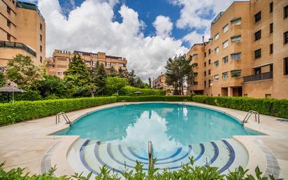 Swimming pool of Flat for sale in  Madrid Capital  with Air Conditioner, Parquet flooring and Storage room