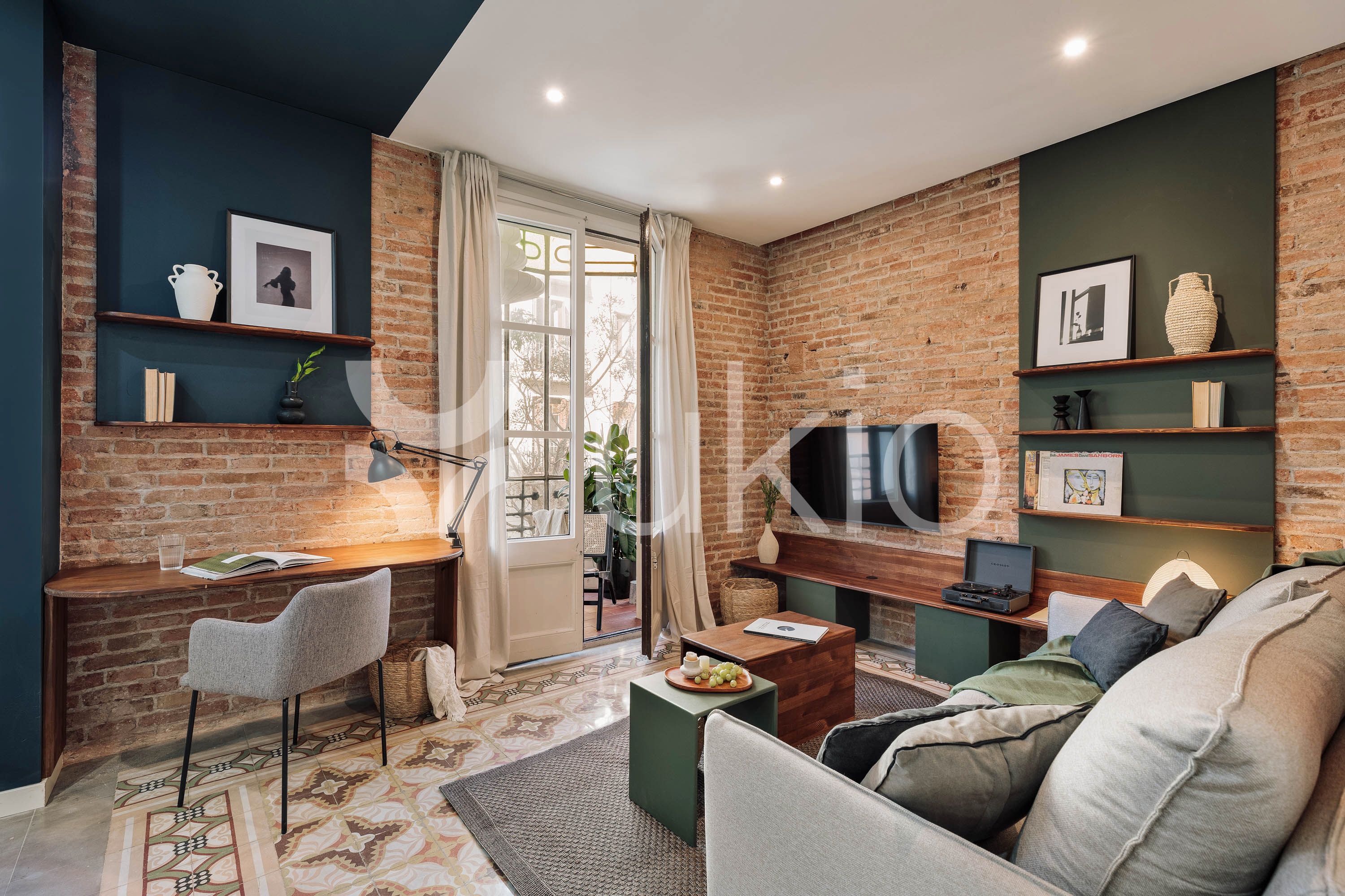 Sala d'estar de Apartament de lloguer en  Barcelona Capital amb Aire condicionat, Calefacció i Moblat