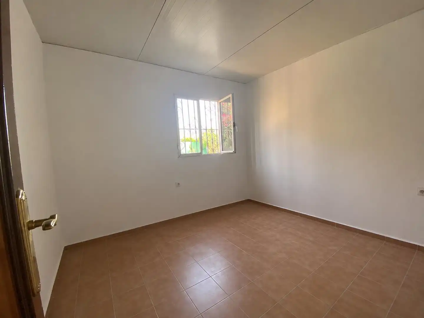Dormitori de Finca rústica de lloguer en Carmona amb Jardí privat
