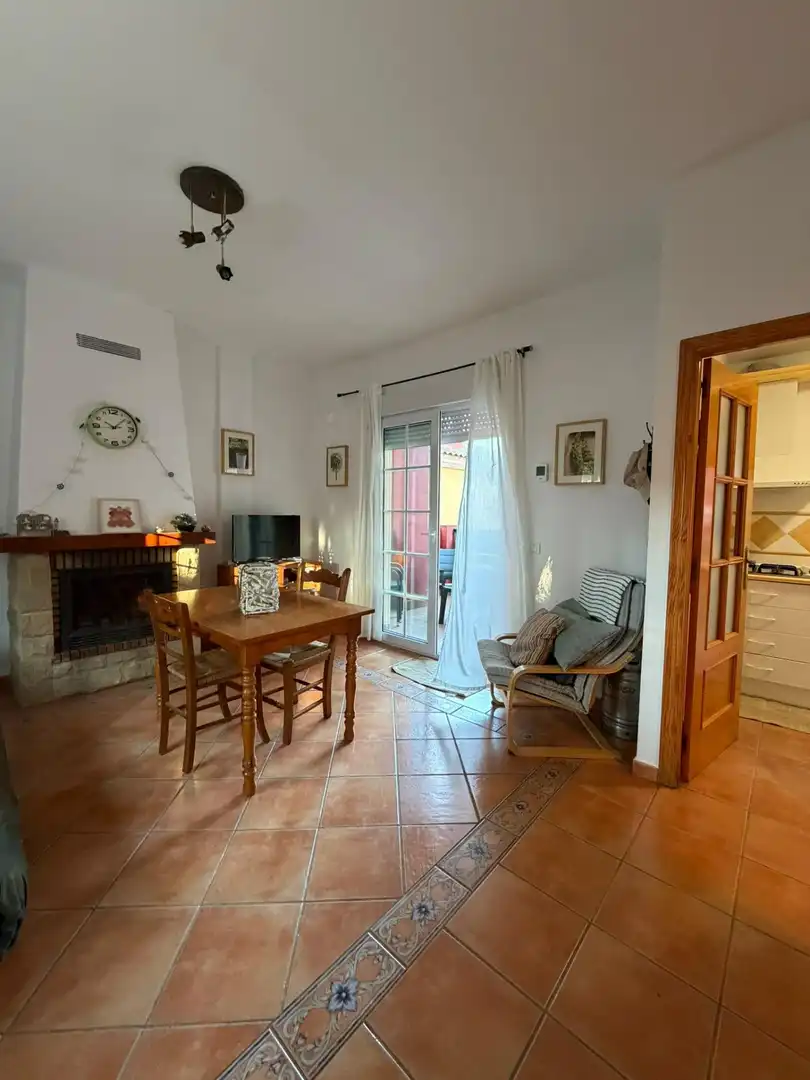 Sala de estar de Casa adosada en venta en Islantilla con Jardín privado, Terraza y Trastero