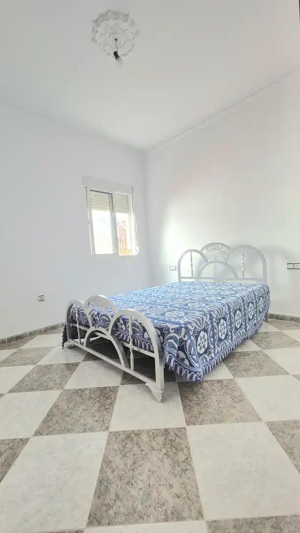 Habitación de Casa adosada en venta en Alcolea del Río con Alarma