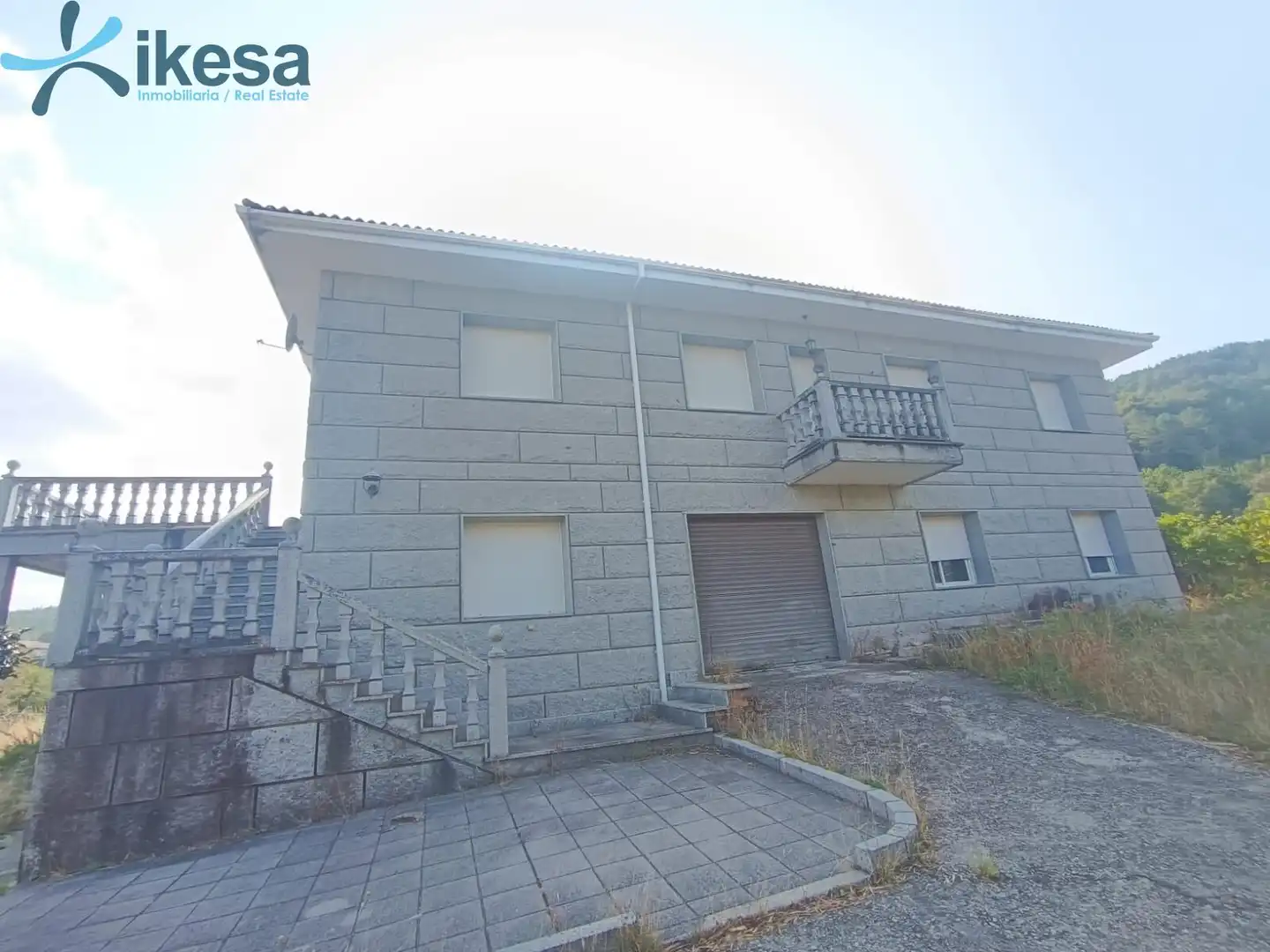 Vista exterior de Casa o xalet en venda en Entrimo amb Jardí privat