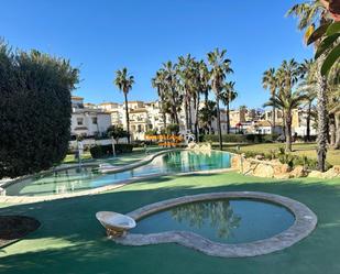 Piscina de Casa adosada de lloguer en Santa Pola amb Aire condicionat, Calefacció i Terrassa