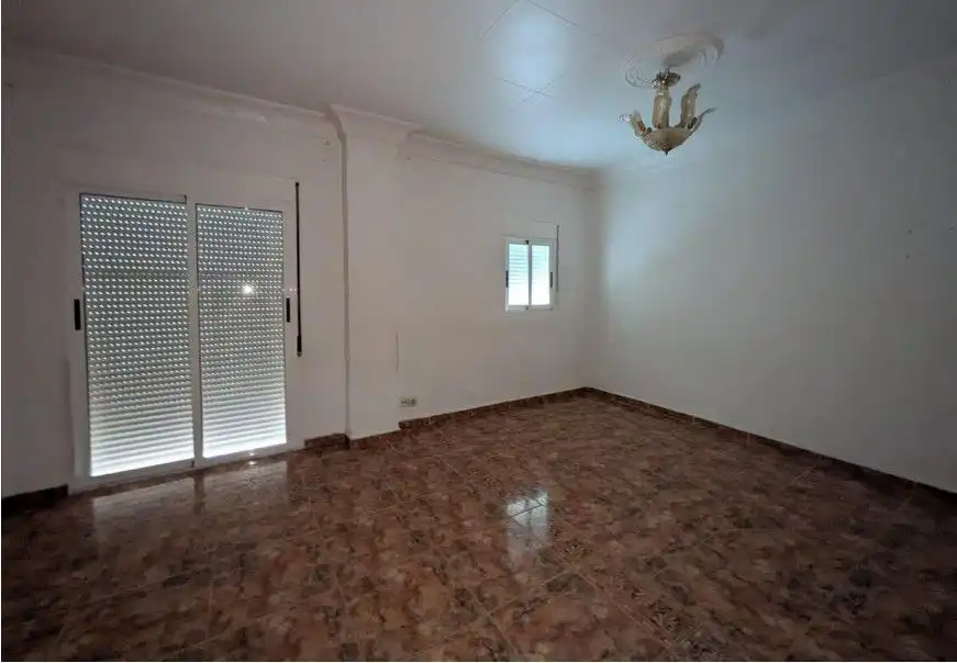 Sala de estar de Casa adosada en venta en Tortosa con Terraza y Balcón