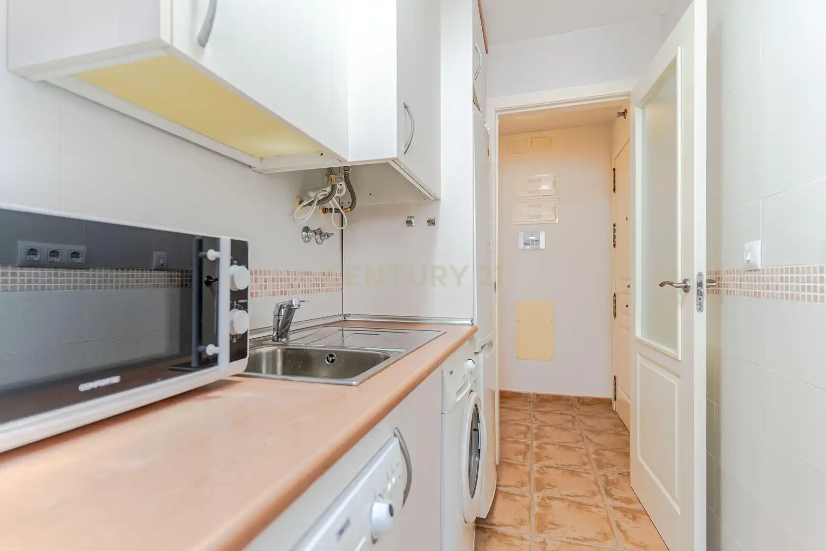 Cuina de Apartament en venda en Vélez de Benaudalla amb Aire condicionat i Piscina comunitària