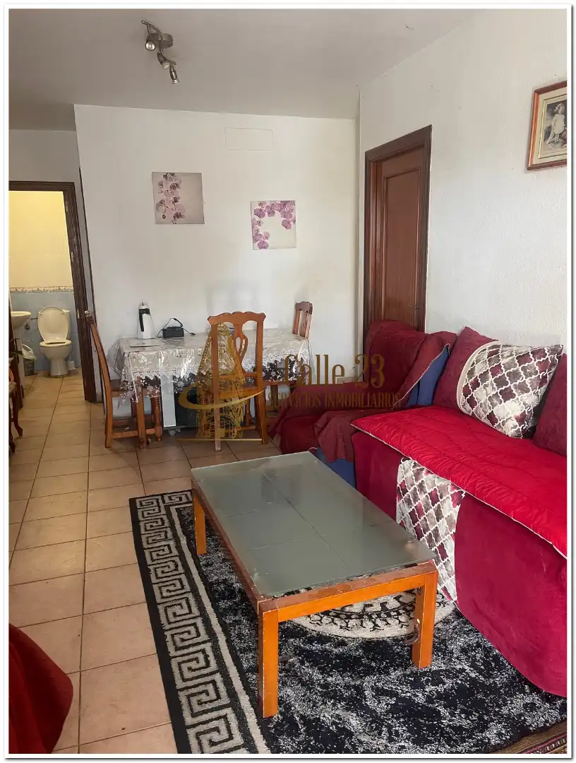 Sala de estar de Casa adosada en venta en San Juan del Puerto con Terraza