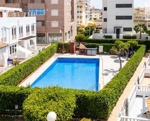 Swimming pool of Duplex for sale in Torrevieja  with Air Conditioner, Terrace and Swimming Pool