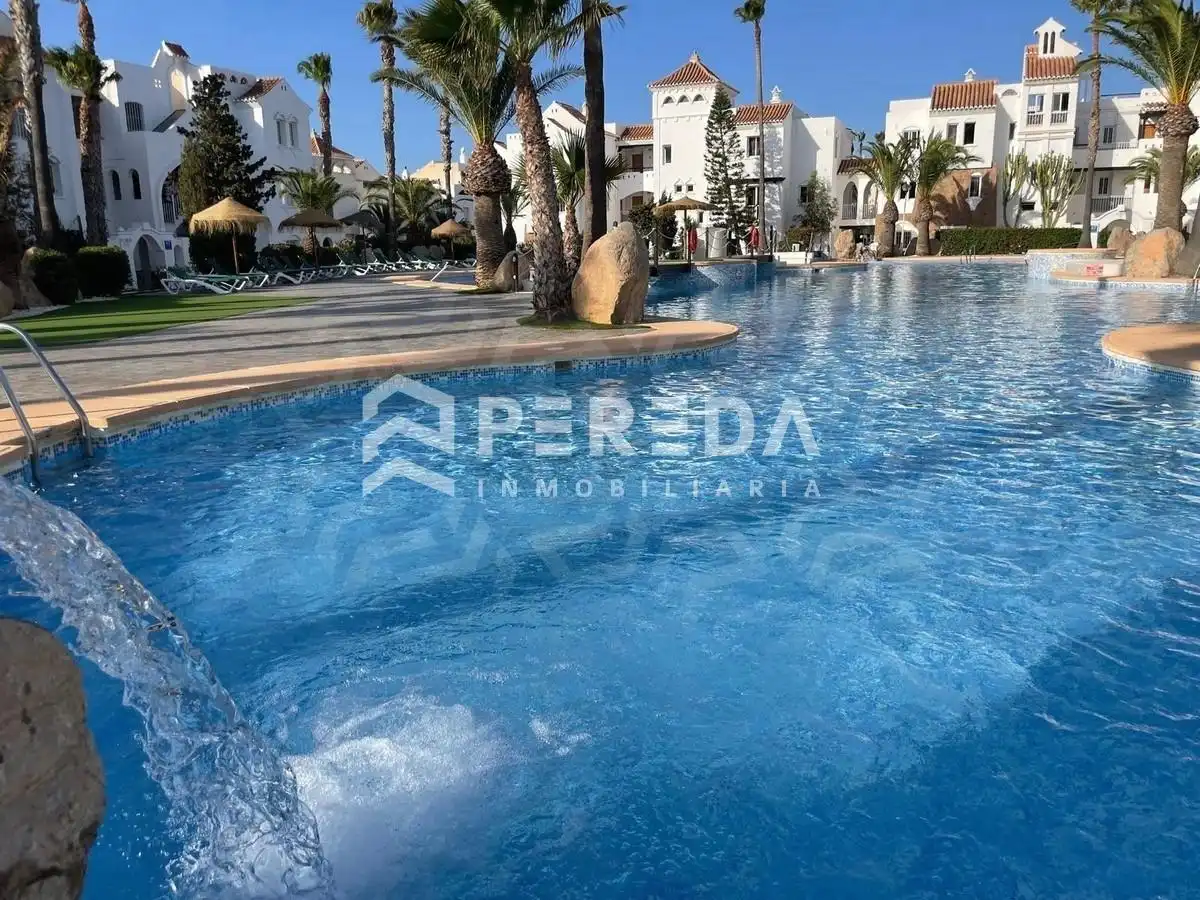 Piscina de Apartamento en venta en Roquetas de Mar con Aire acondicionado, Jardín privado y Terraza