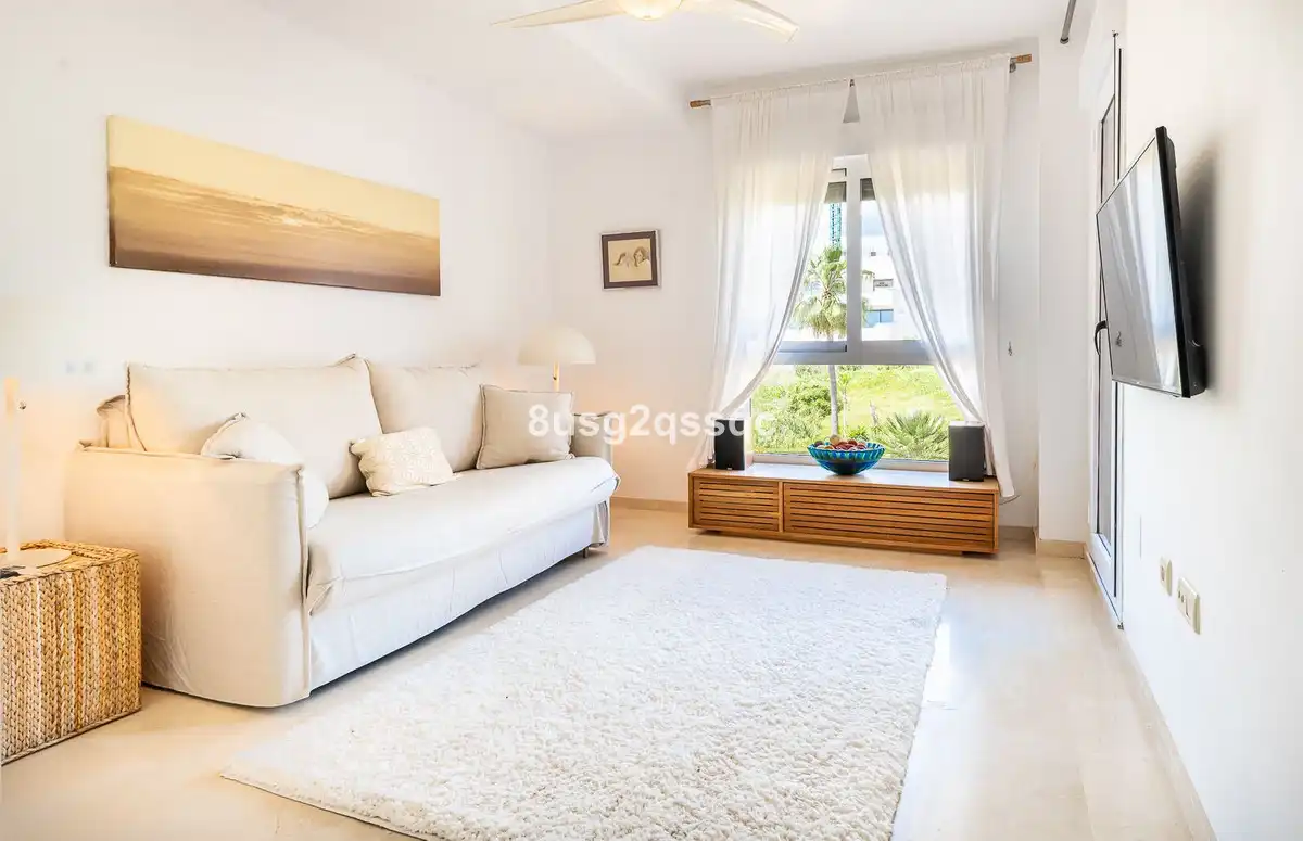 Living room of Flat for sale in Estepona  with Air Conditioner, Furnished and TV