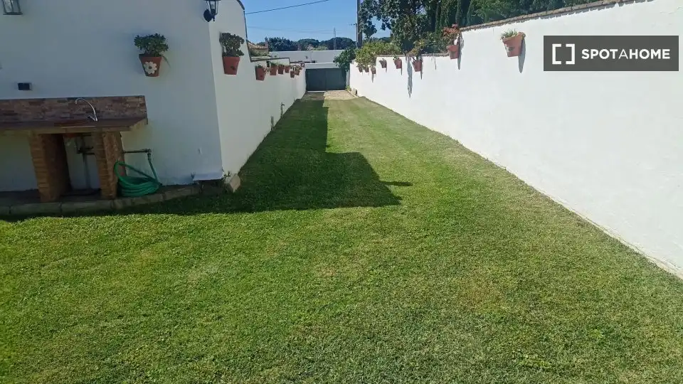 Jardín de Apartamento para compartir en Barbate con Aire acondicionado, Terraza y Amueblado