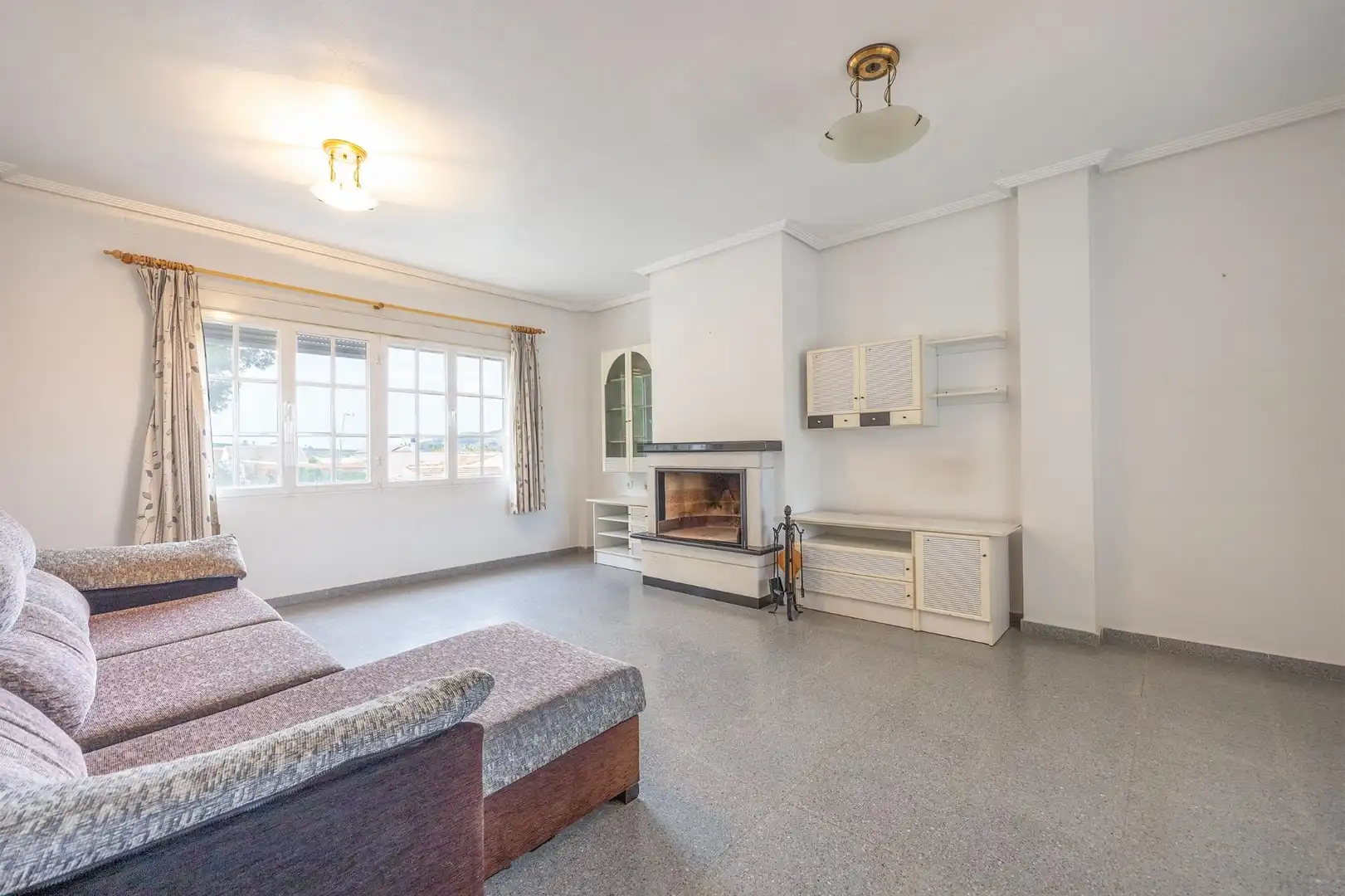 Sala d'estar de Casa o xalet en venda en Orihuela amb Aire condicionat, Jardí privat i Terrassa