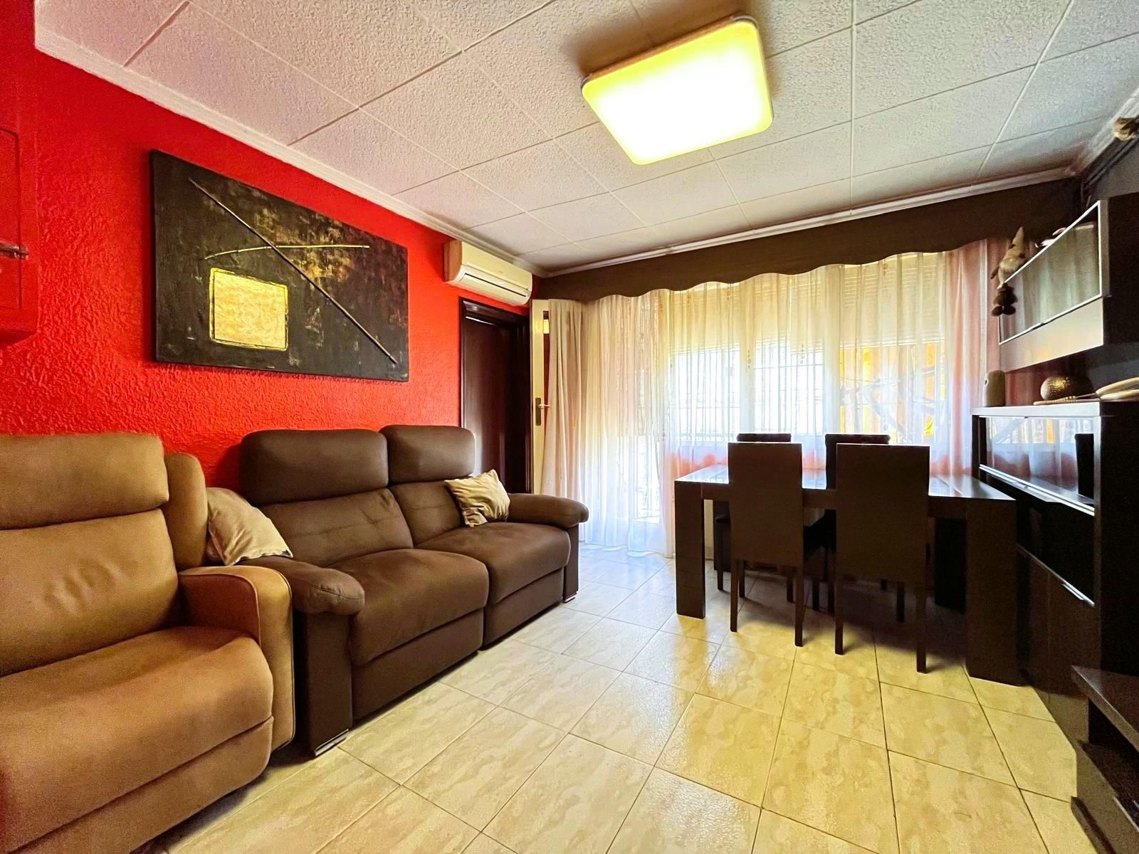 Living room of Planta baja for sale in Sabadell  with Air Conditioner, Heating and Balcony