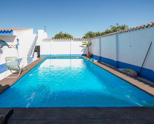 Swimming pool of House or chalet for sale in Utrera  with Air Conditioner, Terrace and Swimming Pool