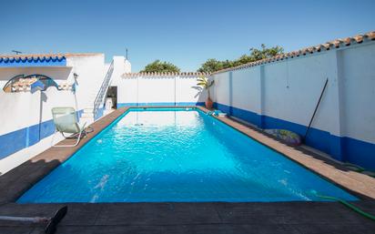 Swimming pool of House or chalet for sale in Utrera  with Air Conditioner, Terrace and Swimming Pool