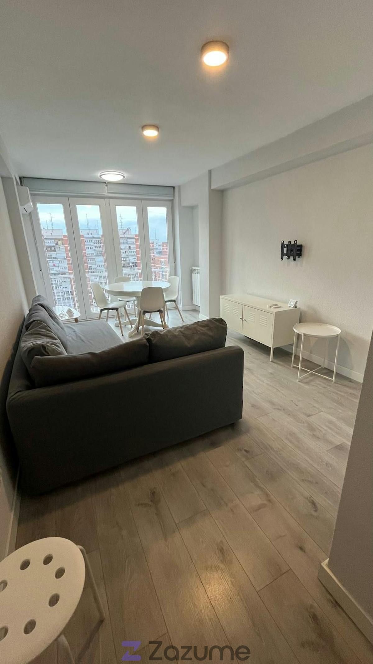 Sala de estar de Piso de alquiler en  Madrid Capital con Aire acondicionado, Calefacción y Amueblado