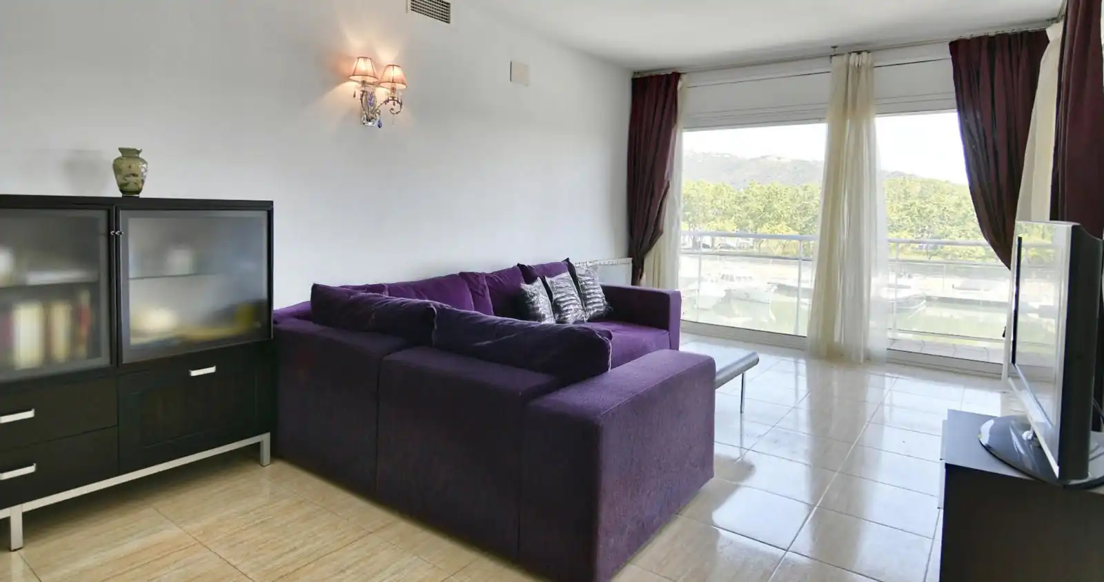 Sala de estar de Piso en venta en Castell d'Aro, Platja d'Aro i s'Agaró con Aire acondicionado, Calefacción y Terraza