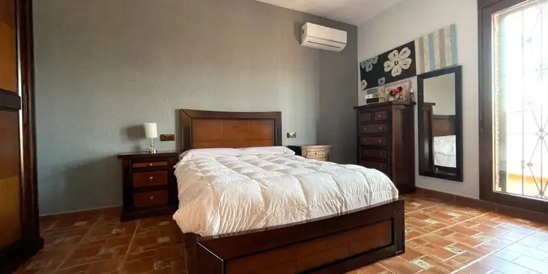 Dormitori de Casa o xalet en venda en Loja amb Aire condicionat, Jardí privat i Terrassa