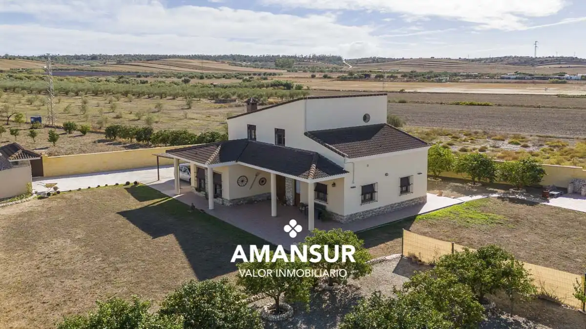 Vista exterior de Casa o xalet en venda en Villarrasa amb Aire condicionat, Calefacció i Jardí privat
