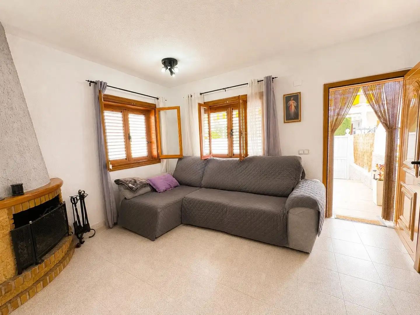 Sala d'estar de Casa adosada en venda en Santa Pola amb Terrassa i Piscina comunitària