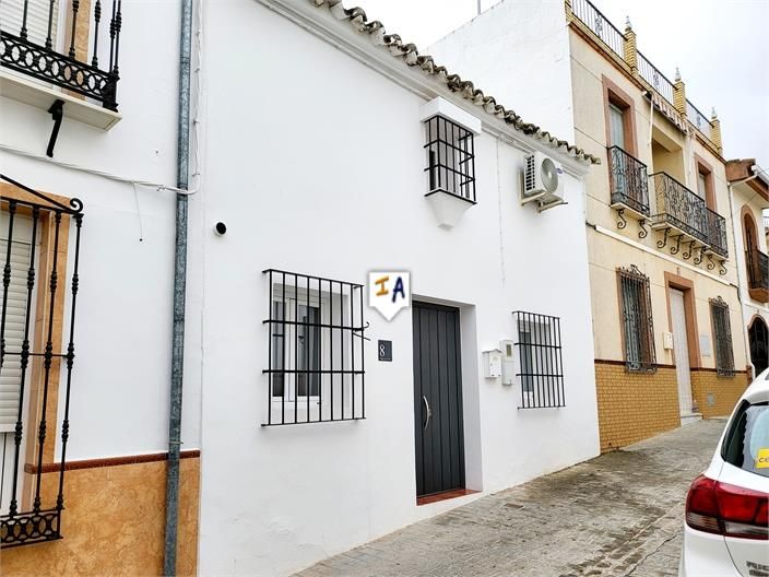 Vista exterior de Casa adosada en venda en Villanueva de San Juan amb Aire condicionat, Traster i Piscina