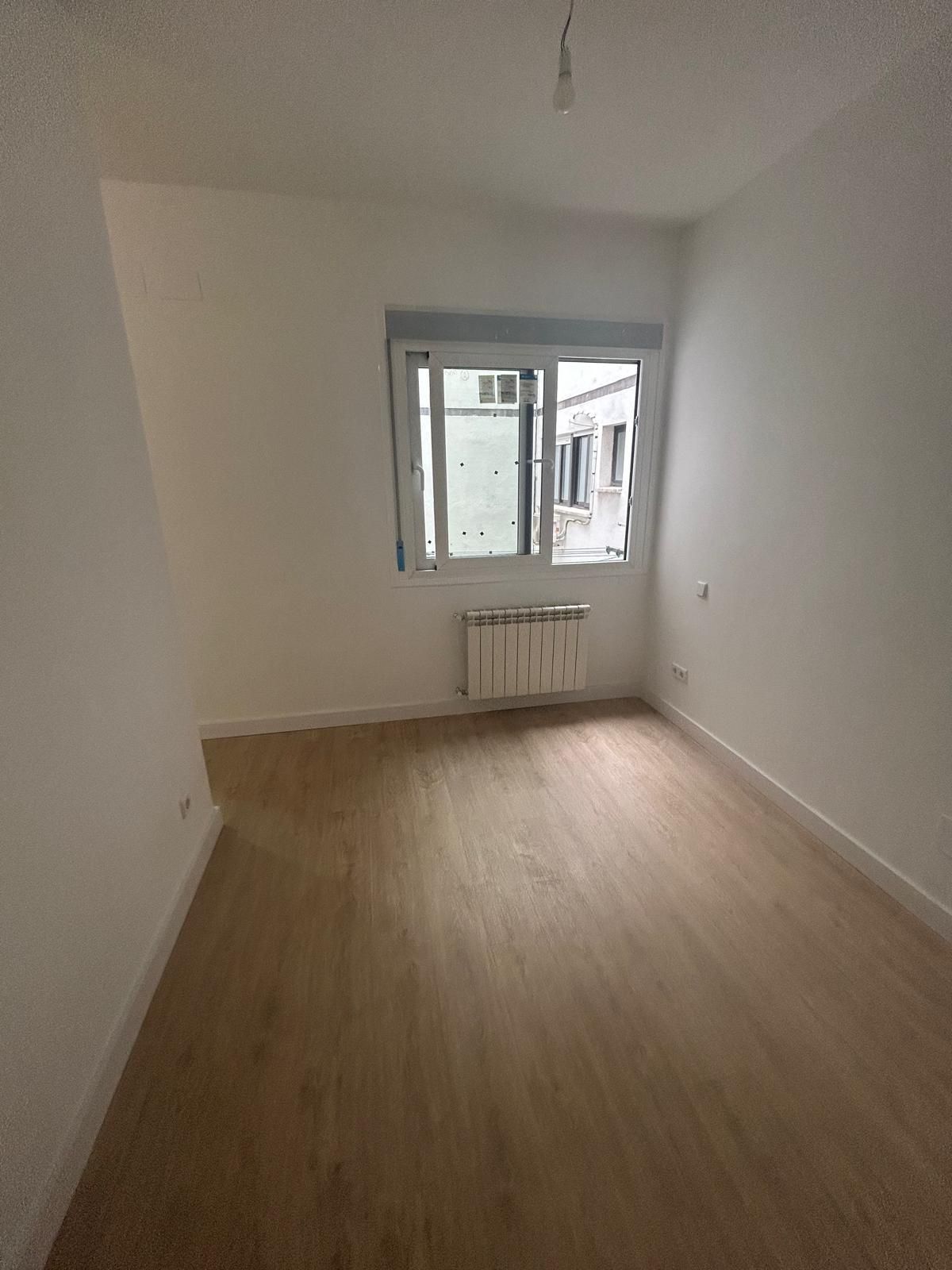 Dormitori de Apartament de lloguer en  Madrid Capital amb Calefacció