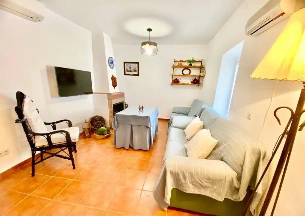Sala de estar de Casa adosada en venta en Istán con Aire acondicionado, Calefacción y Terraza