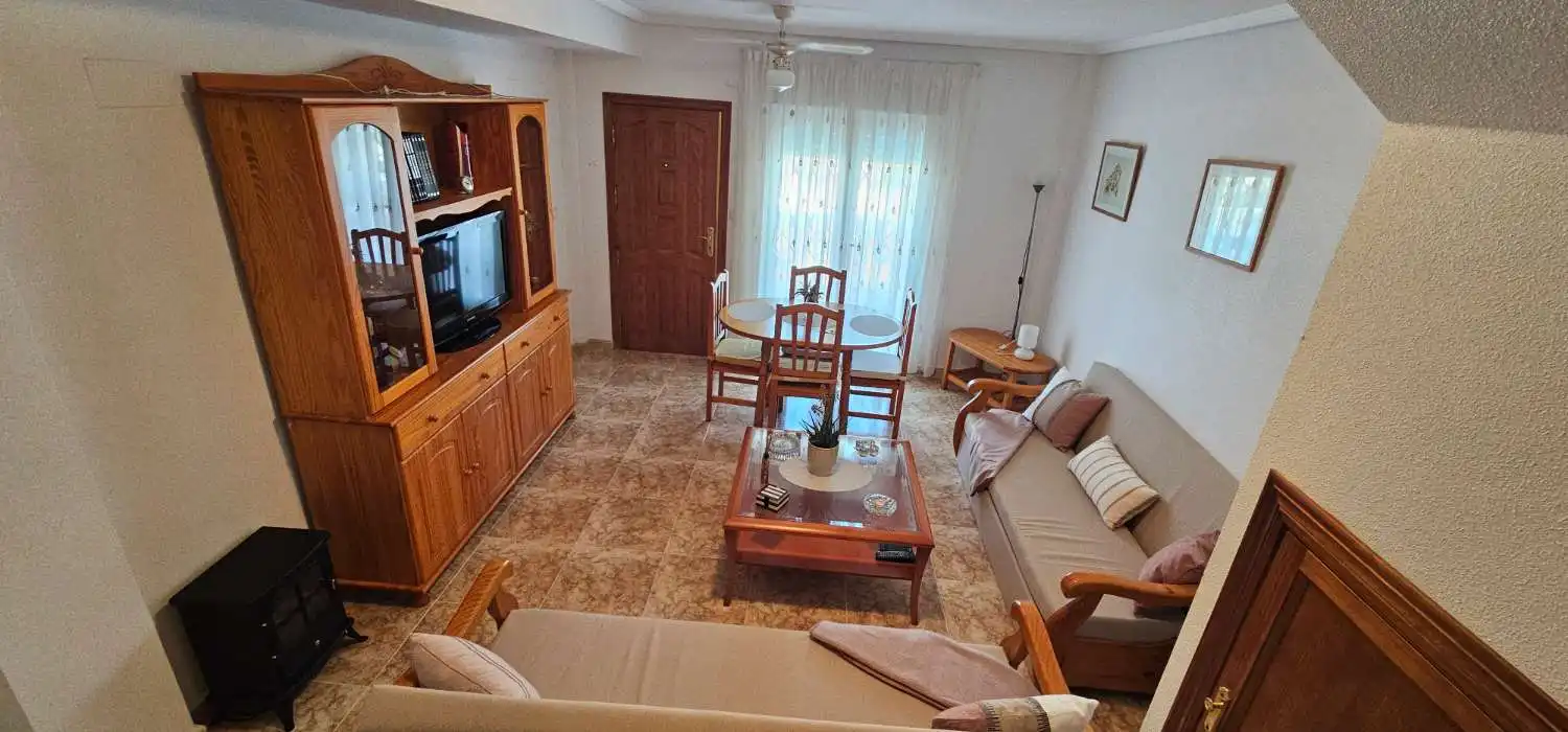 Sala de estar de Dúplex en venta en Orihuela con Terraza, Piscina y Amueblado
