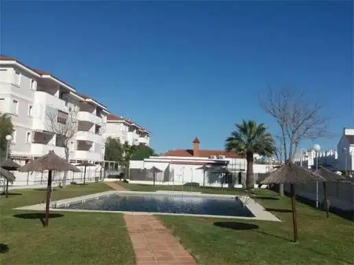 Vista exterior de Apartament en venda en El Portil amb Moblat i Piscina comunitària